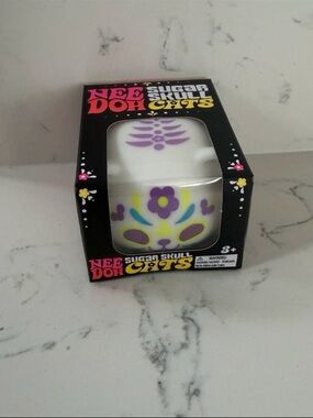 NeeDoh Rare Glow in Dark Sugar Skull Cat,White with Purple, Yellow, Blue Accents